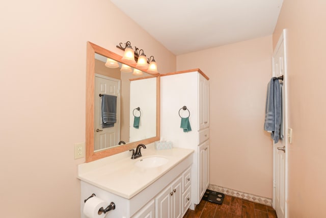 bathroom with vanity and wood-type flooring