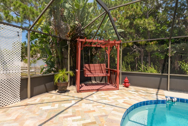 view of patio / terrace with a pergola and glass enclosure