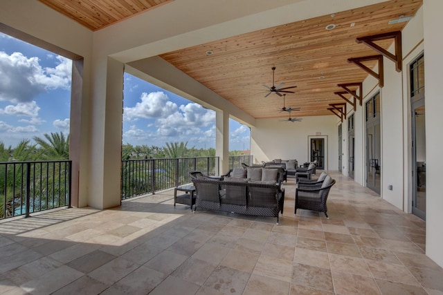 view of patio / terrace with ceiling fan and outdoor lounge area