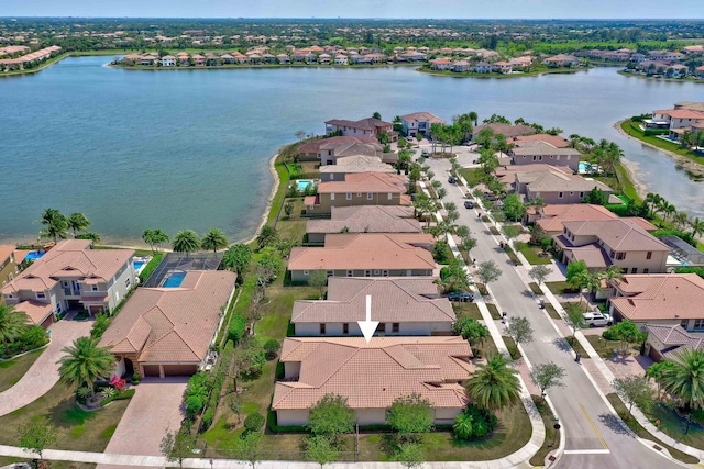 drone / aerial view with a water view