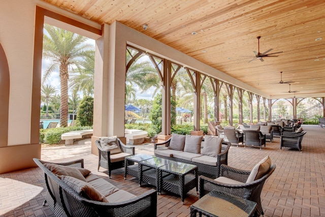 view of patio featuring outdoor lounge area and ceiling fan