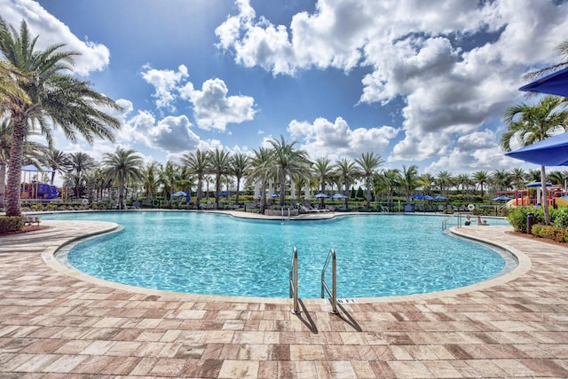 view of pool featuring a patio area