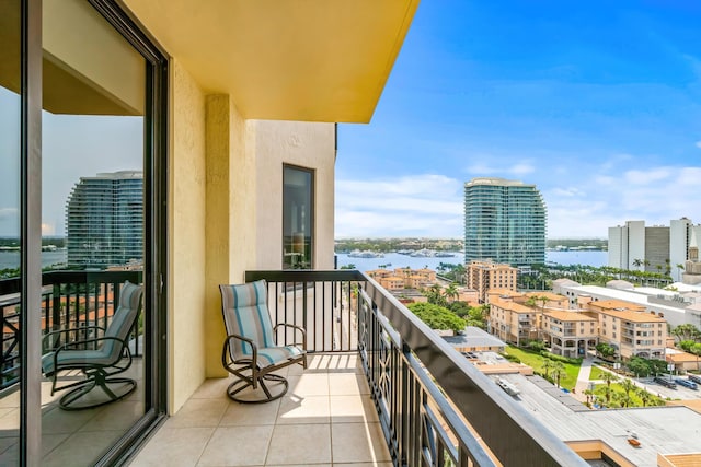 balcony featuring a water view