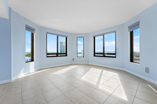 view of tiled spare room