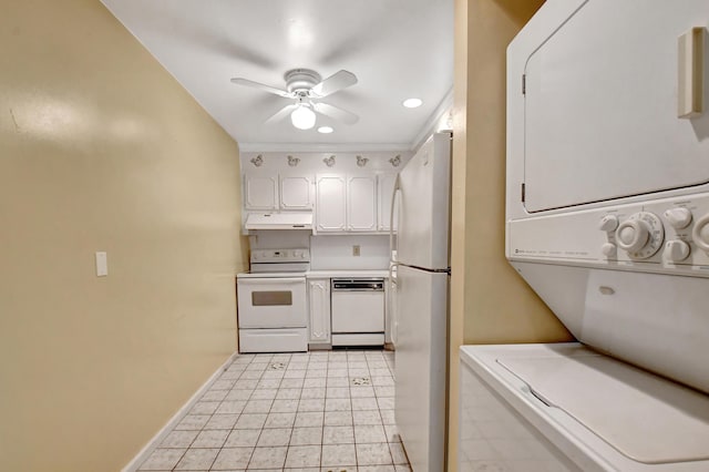 kitchen with white cabinetry, ceiling fan, white appliances, light tile patterned flooring, and stacked washer and clothes dryer