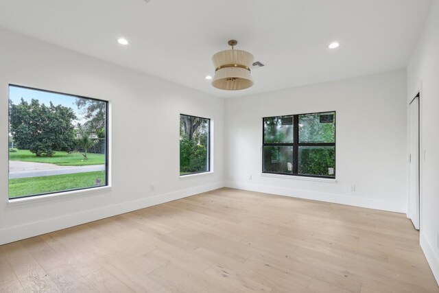 empty room with light wood-type flooring