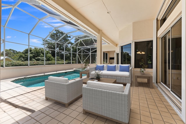 view of pool with an outdoor living space, a lanai, and a patio