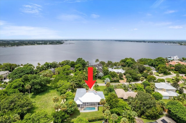 birds eye view of property featuring a water view