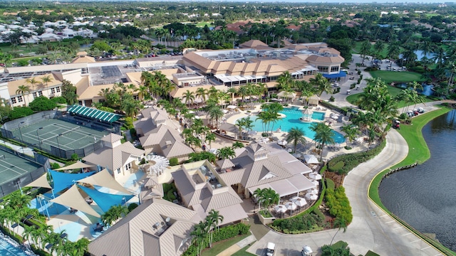 birds eye view of property with a residential view and a water view