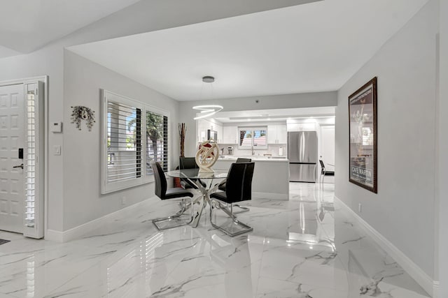 dining room with light tile floors