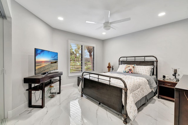 tiled bedroom with ceiling fan