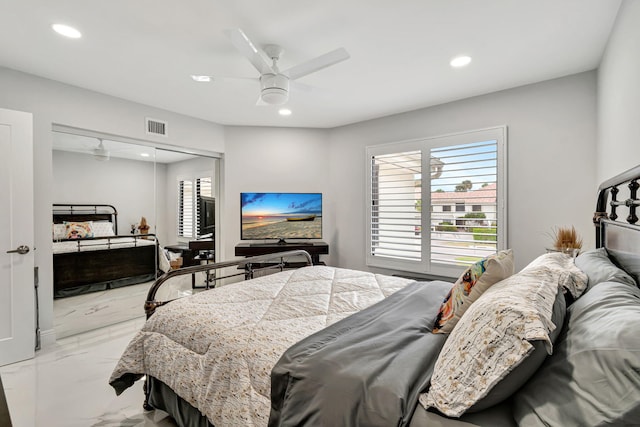 bedroom featuring a closet and ceiling fan