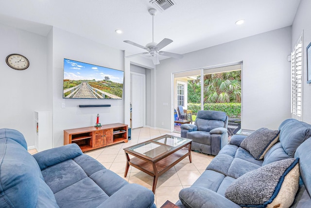 tiled living room featuring ceiling fan