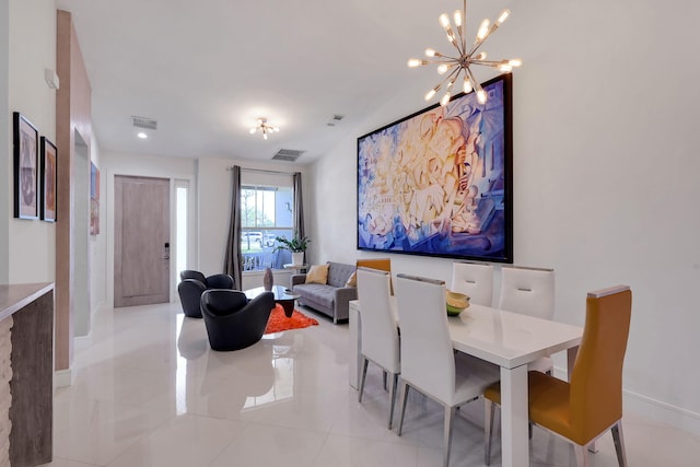 dining room with light tile patterned floors and an inviting chandelier