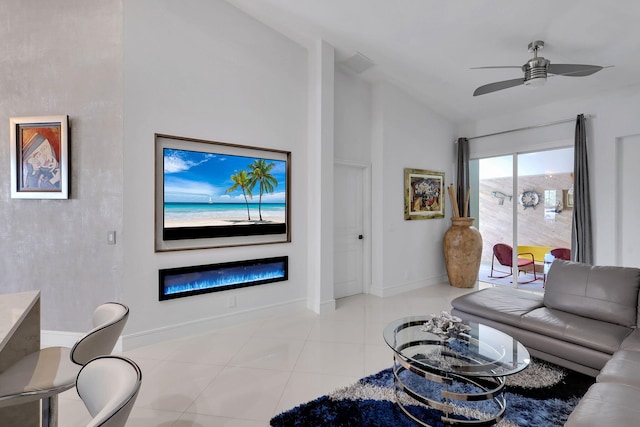 living room featuring ceiling fan and light tile patterned flooring