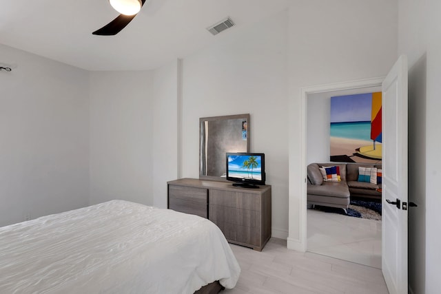 bedroom featuring ceiling fan and light hardwood / wood-style flooring