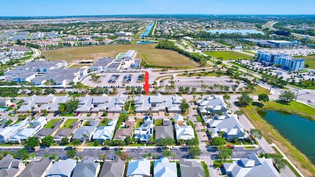 drone / aerial view featuring a water view