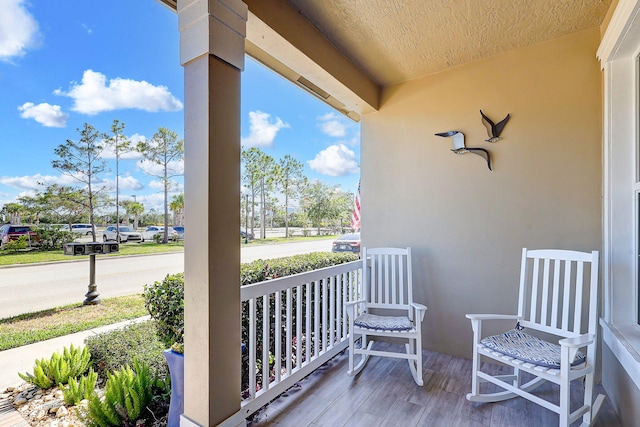 balcony featuring covered porch