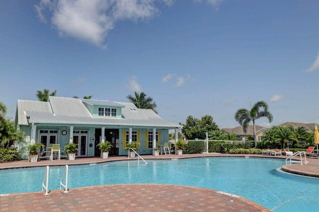 view of pool featuring a patio