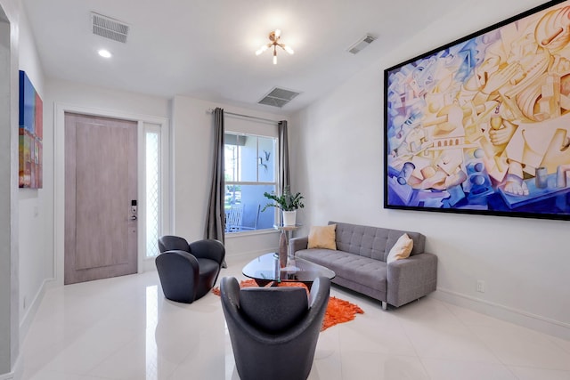 living room with light tile patterned floors