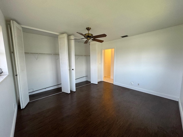 unfurnished bedroom featuring wood-type flooring and ceiling fan