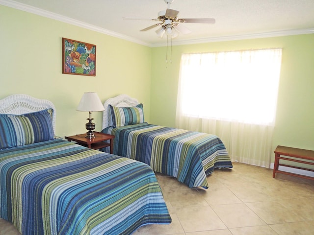 tiled bedroom featuring ceiling fan, ornamental molding, and multiple windows