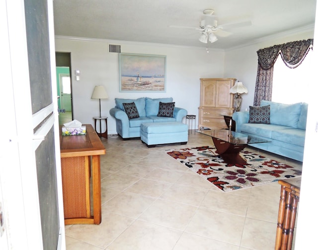 living room with ceiling fan, light tile patterned floors, and ornamental molding