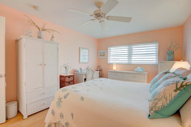 bedroom featuring ceiling fan and light hardwood / wood-style floors