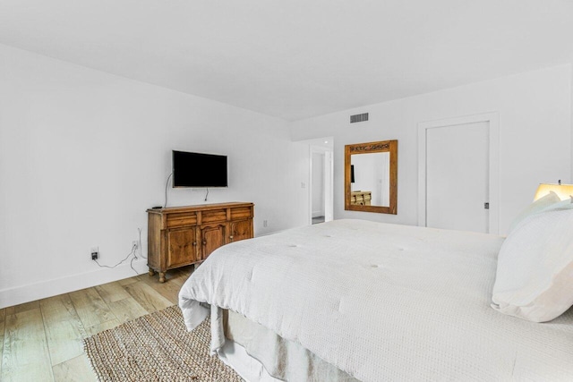 bedroom featuring light hardwood / wood-style flooring