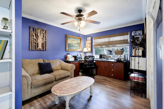 living room with ceiling fan, crown molding, and dark hardwood / wood-style flooring