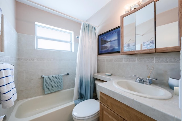 full bathroom featuring vanity, shower / bath combo, backsplash, tile walls, and toilet