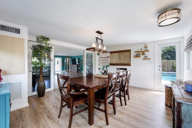 dining room featuring light hardwood / wood-style floors