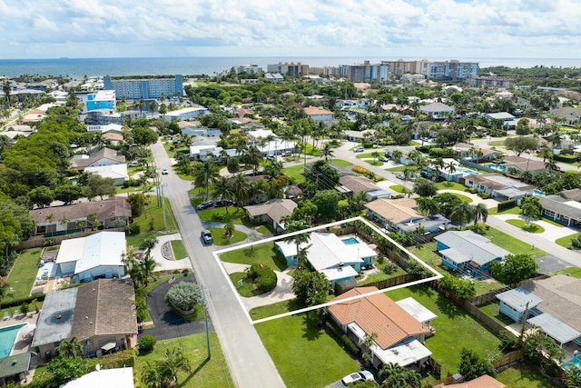 bird's eye view with a water view