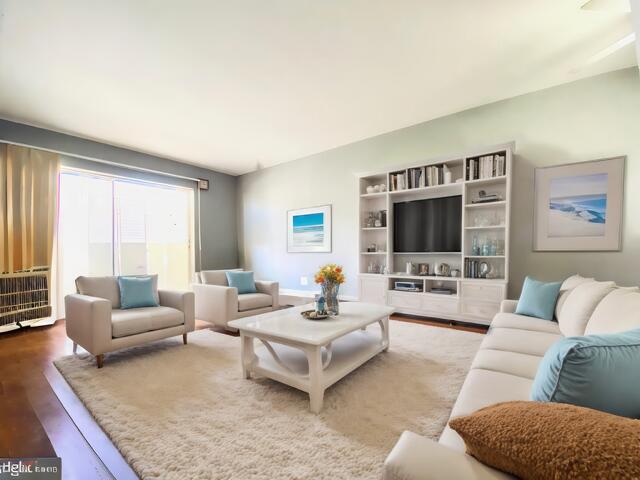 living room featuring wood-type flooring