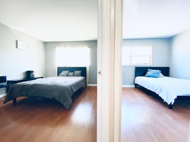 bedroom featuring hardwood / wood-style floors