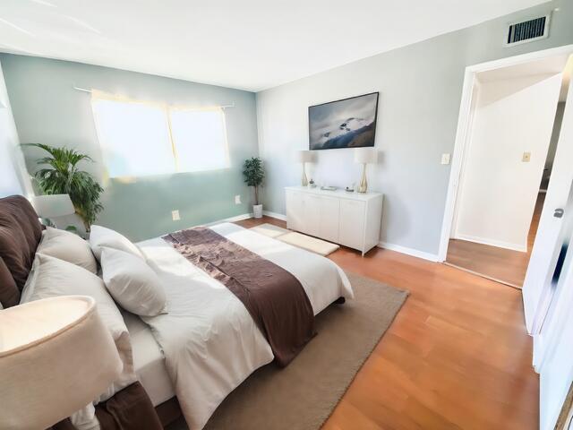 bedroom featuring light hardwood / wood-style flooring