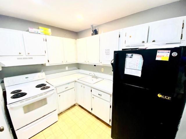 kitchen featuring black fridge, white range with electric cooktop, premium range hood, sink, and light tile floors