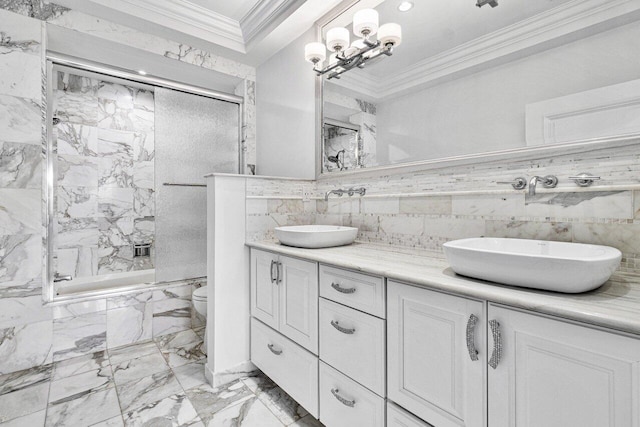 full bathroom with combined bath / shower with glass door, vanity, toilet, and crown molding