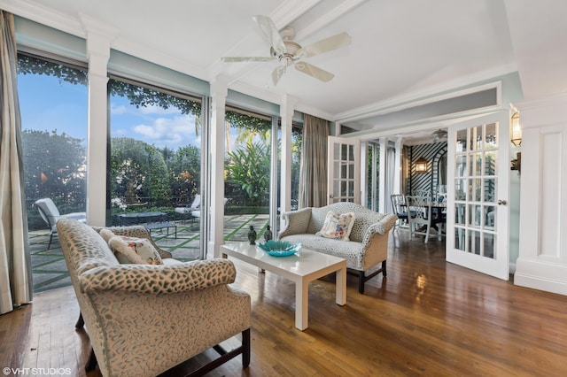 sunroom / solarium featuring ceiling fan