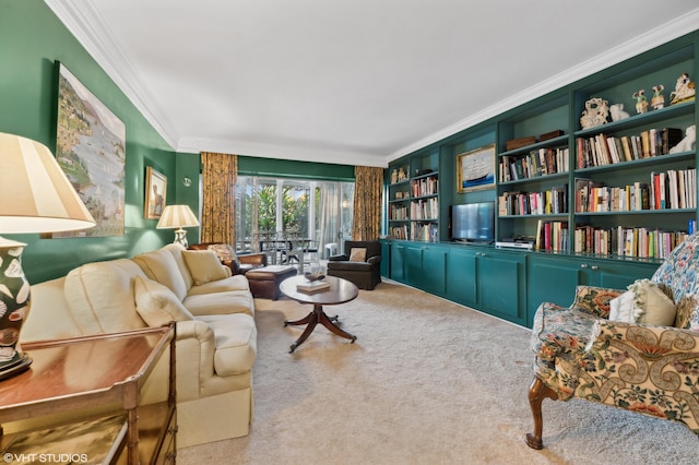 living room with built in shelves, carpet, and crown molding