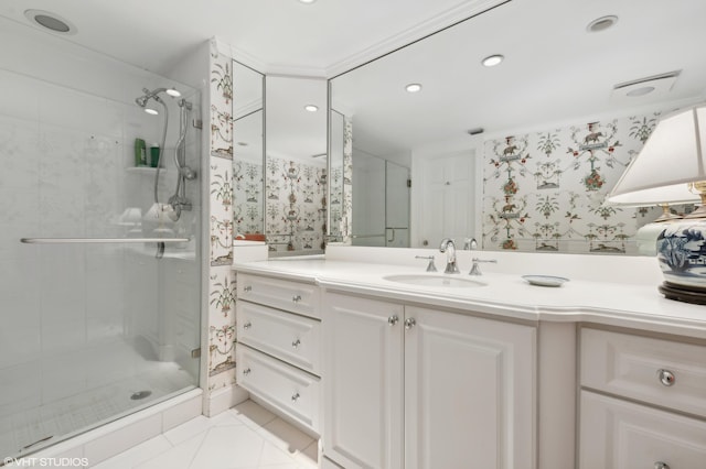 bathroom featuring tile flooring, vanity, and a shower with door