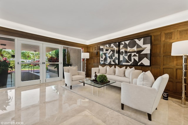 tiled living room featuring french doors