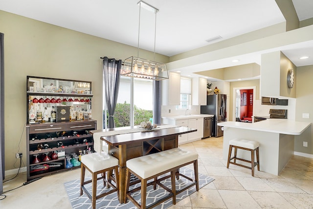 dining room with indoor bar