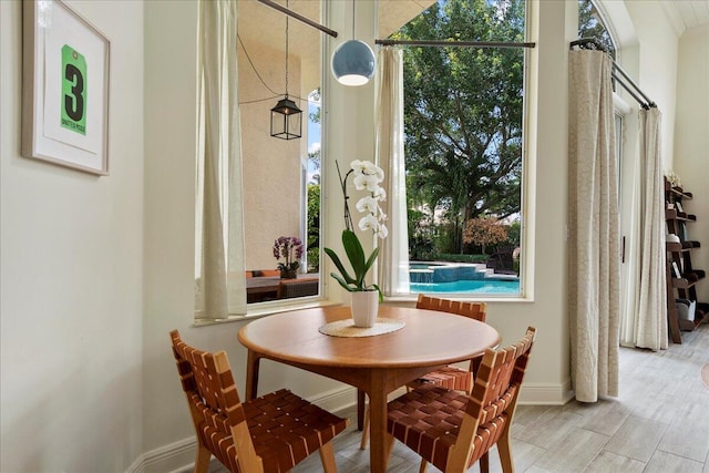 dining room with light wood-type flooring