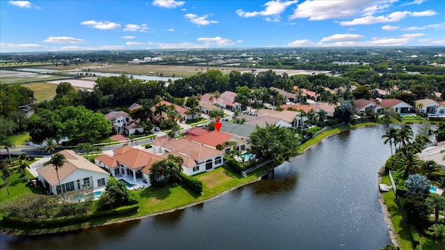 drone / aerial view featuring a water view