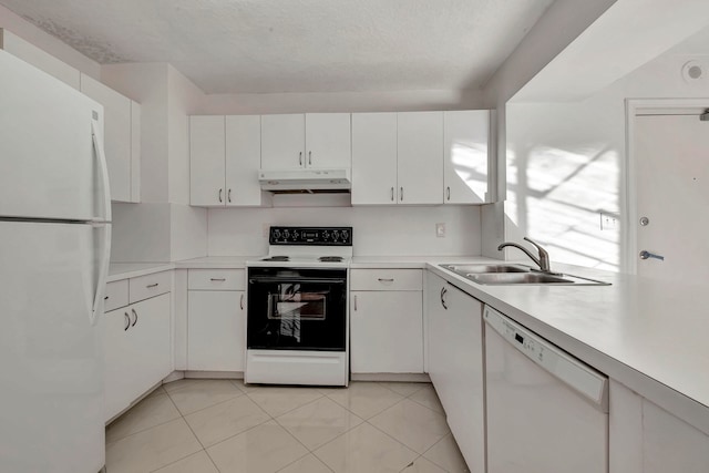 kitchen with sink, white cabinets, white appliances, and light tile floors