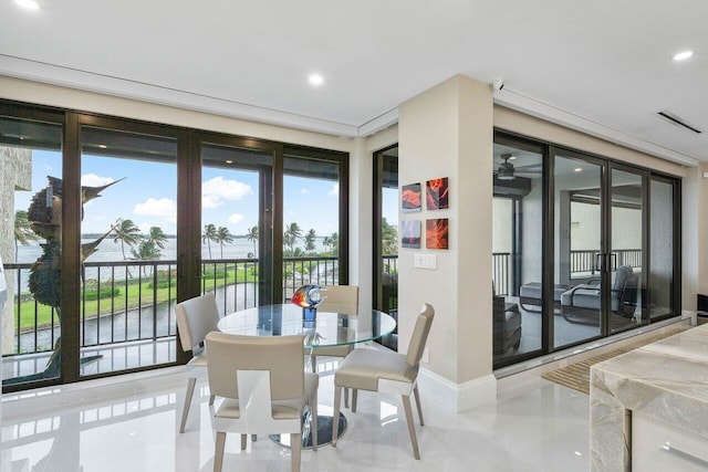 dining room with tile flooring and ceiling fan