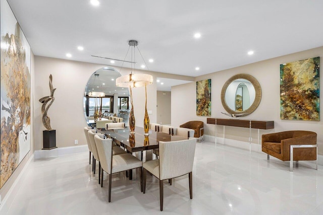 dining area with light tile flooring