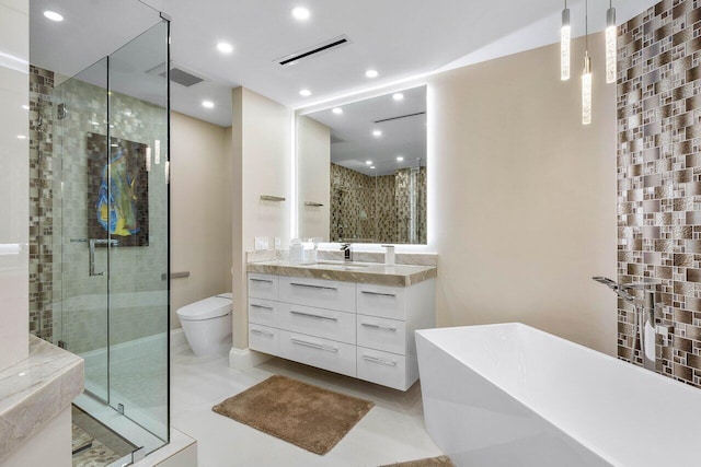 bathroom with walk in shower, tile flooring, vanity, and toilet