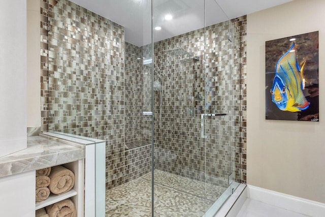 bathroom with an enclosed shower